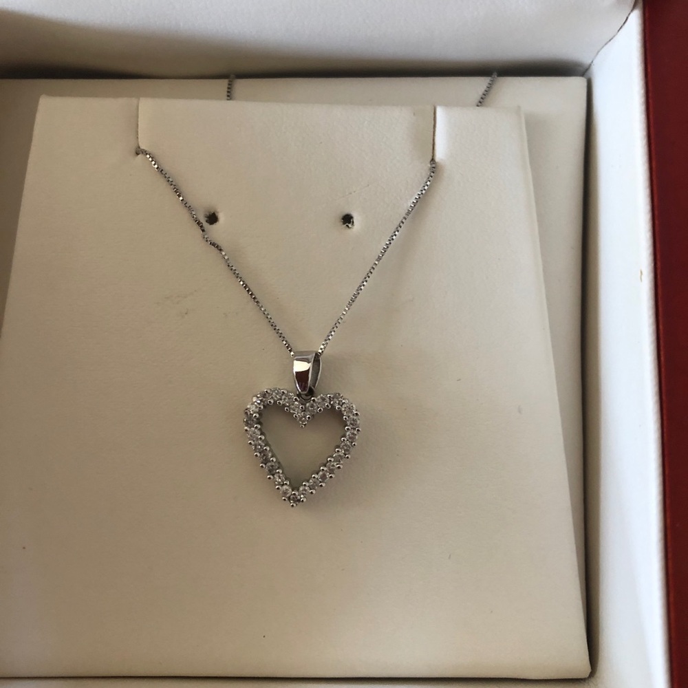 Gorgeous light weight diamond heart necklace.